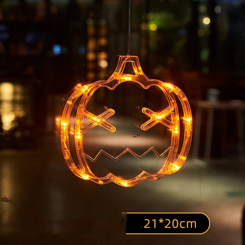 Spooky Halloween window lights featuring ghostly silhouettes, carved pumpkins, and creepy spiders for festive seasonal decor