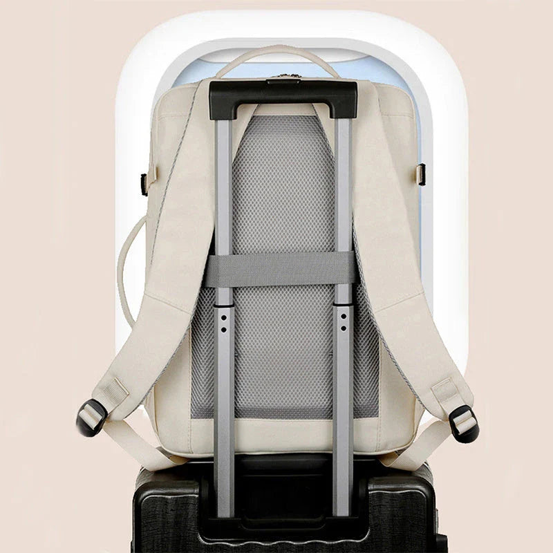 A stylish and high-capacity backpack with multiple pockets and zippers, designed for business and travel use.
