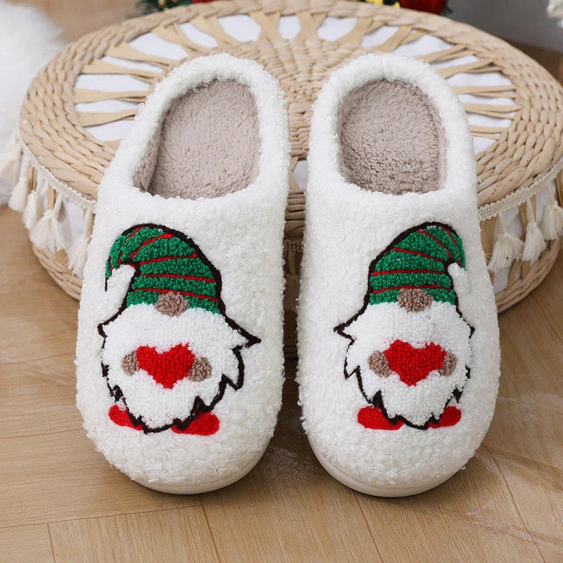 Cozy Santa Claus-themed slippers with plush upper and anti-slip soles for comfortable indoor wear during the holidays