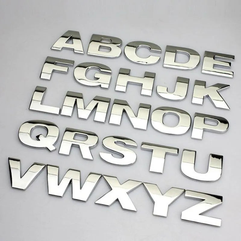 Metal zinc alloy car bumper sticker letters showing 3D design in black and silver finishes