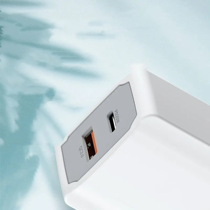 White phone fast charger set with compact charging head and USB cable on a white background.