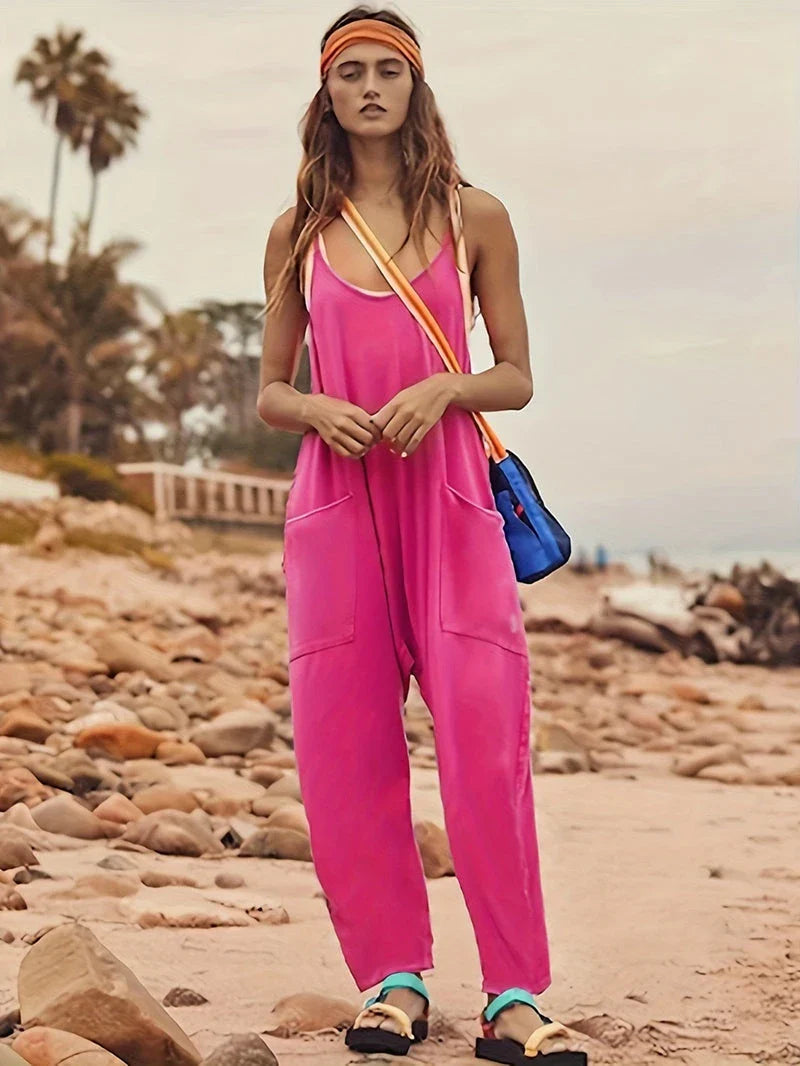A stylish sleeveless jumpsuit with pockets and zipper closure, available in a variety of colors