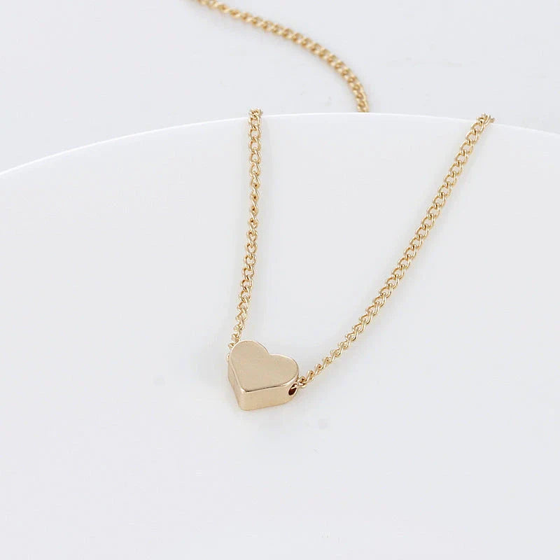 A stylish double-sided love pendant necklace made of premium alloy and featuring a chic geometric design, perfect for elevating any outfit.