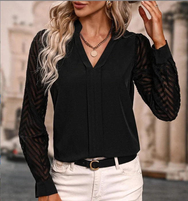 Elegant V-neck chiffon blouse with lace trim, available in a range of contemporary colours for the modern woman's wardrobe.
