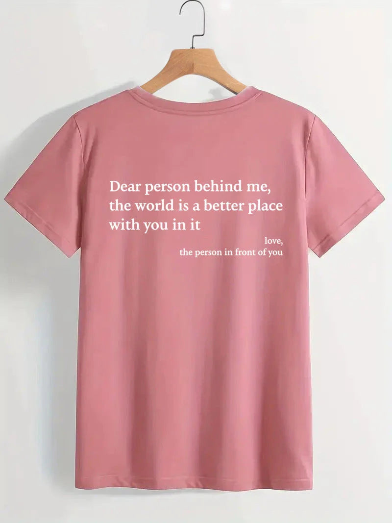 Stylish women's graphic t-shirt with trendy slogan, featuring a vibrant print design and comfortable short sleeve silhouette.
