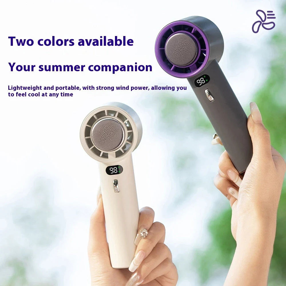 Powerful portable handheld turbine fan with cooling system, adjustable airflow, long-lasting battery, and compact design for on-the-go refreshment.