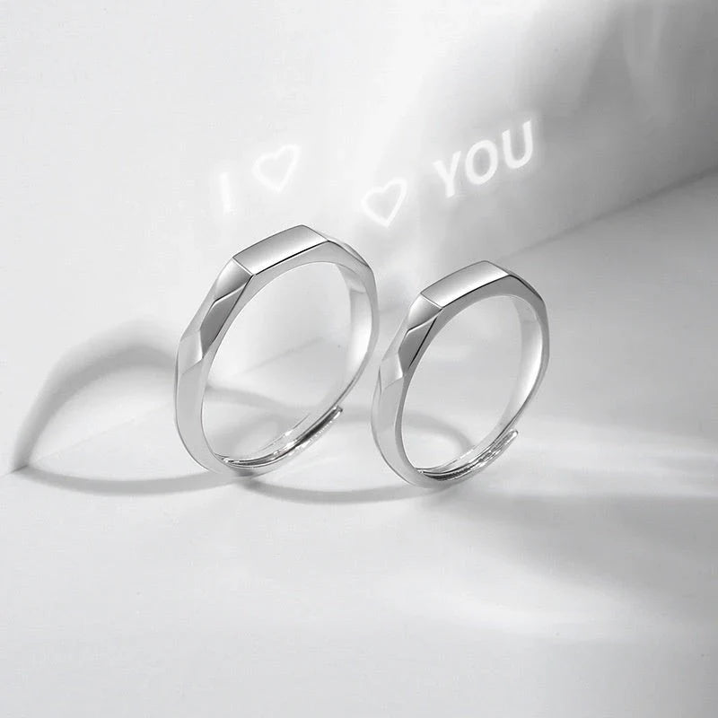 Elegant S925 sterling silver rings with a hidden love pattern design, adjustable sizing for a personalized fit.