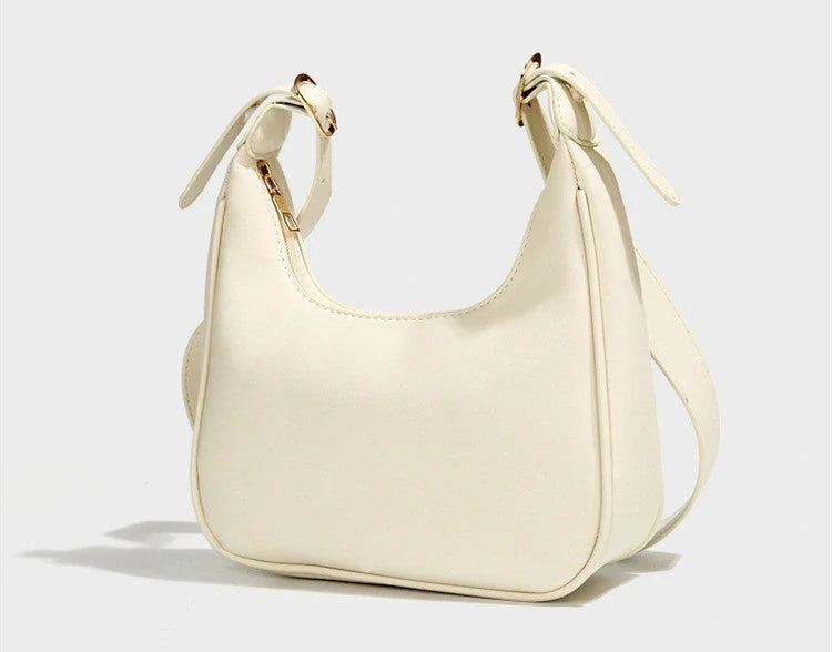 Stylish women's crossbody dumpling bag in soft PU with a crescent shape