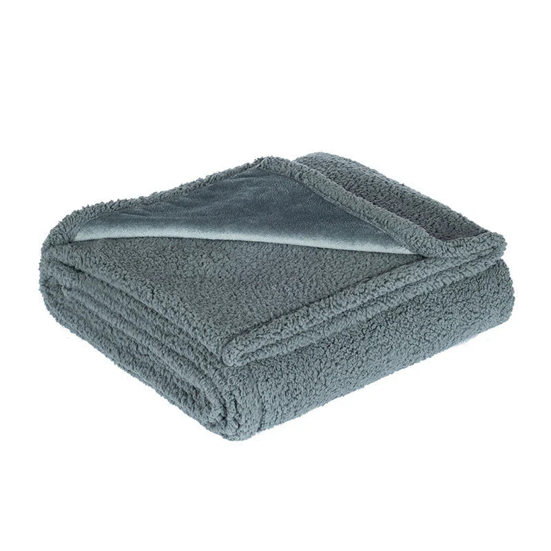Cozy flannel dog blanket with soft sherpa accents for all-season comfort and warmth