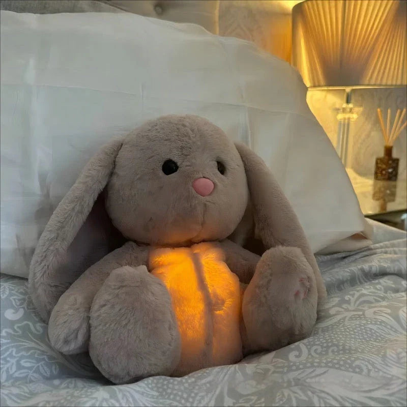 Soothing and relaxing plush breathing bunny toy with calming lights and music to help babies and toddlers sleep