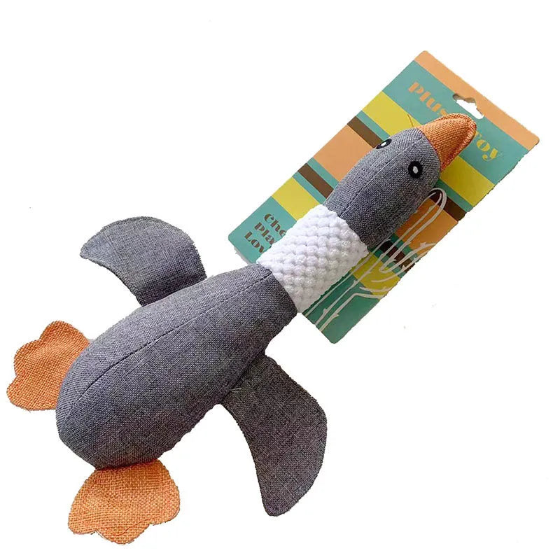 Blue duck-shaped dog plush toy with two squeakers for dental cleaning, 33 cm by 10 cm