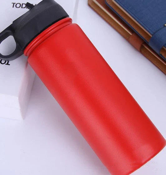 Stainless steel insulated water bottle with wide mouth and push-button lid for hot and cold beverages