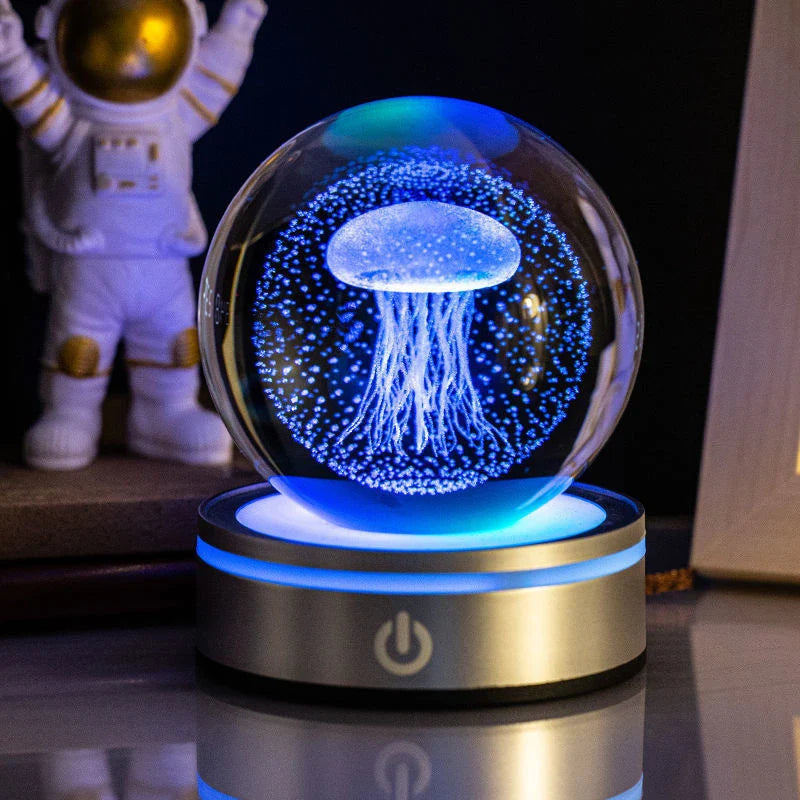 Luminous crystal ball with various celestial-inspired designs, including the Milky Way, Solar System, and Constellation.