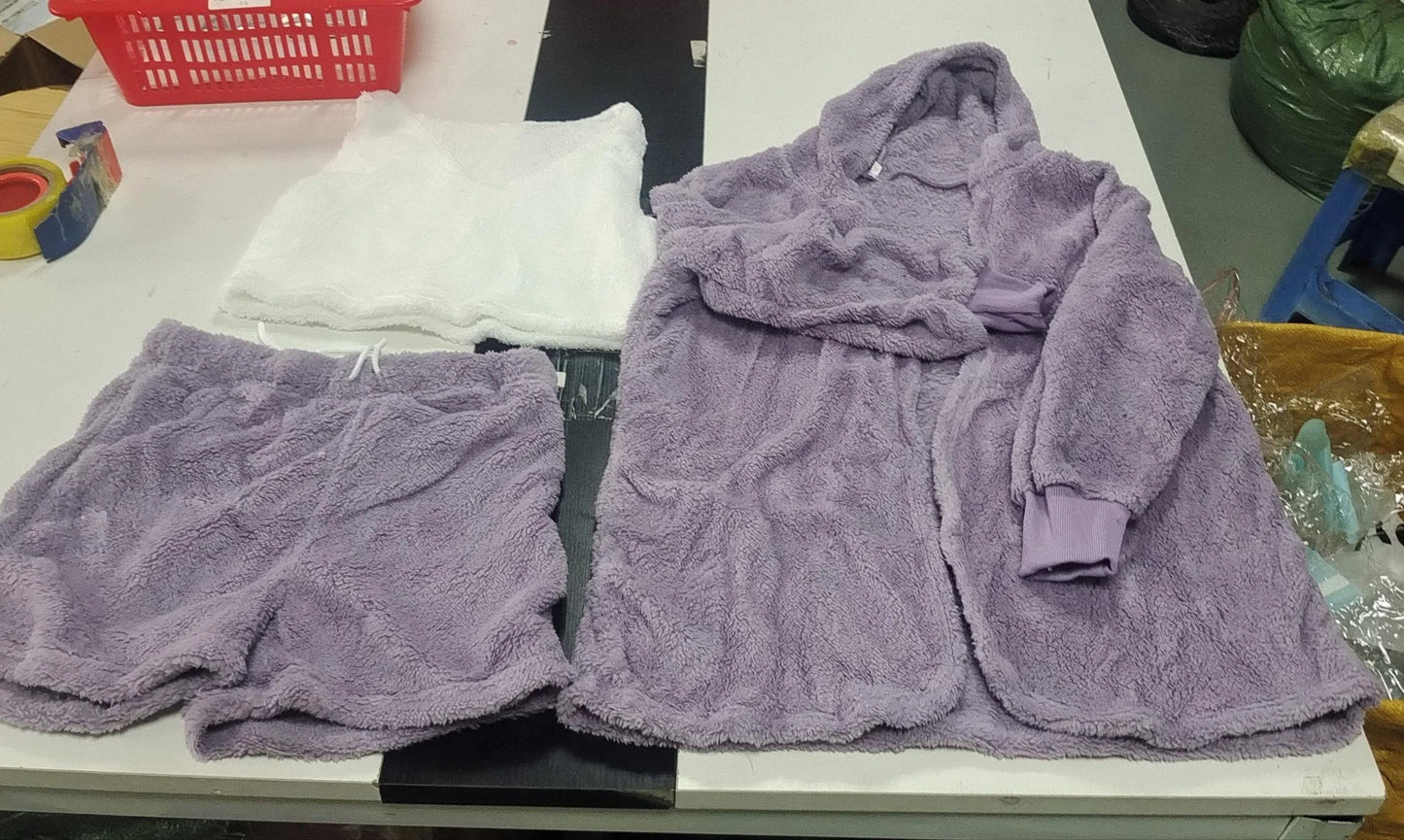 A cozy 3-piece loungewear set featuring a long sleeve crop top and drawstring shorts in a variety of stylish colors.