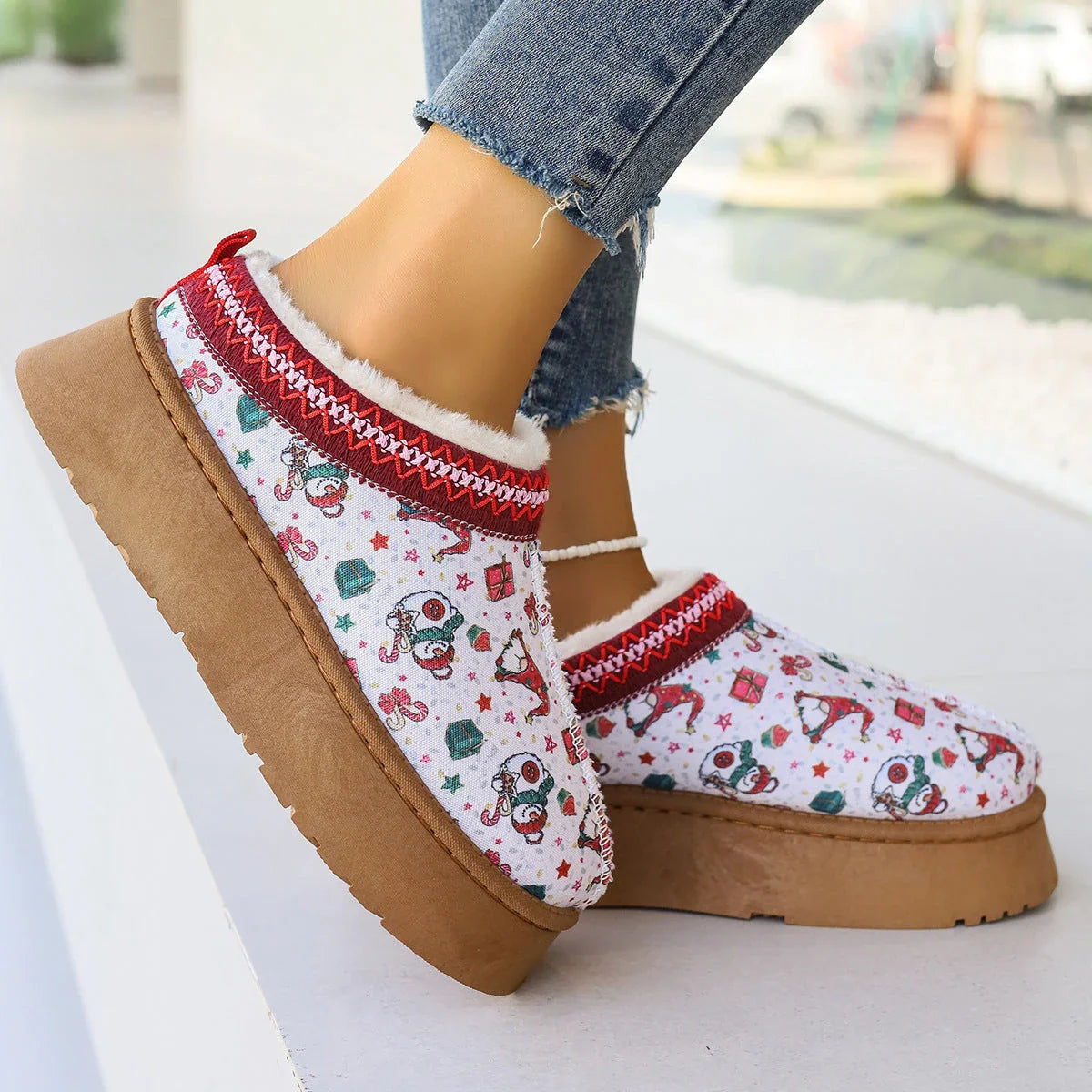 Cozy winter ankle boots featuring festive Christmas prints and plush lining for women