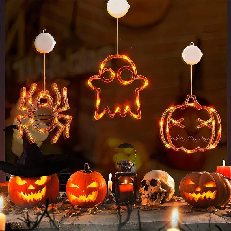 Spooky Halloween window lights featuring ghostly silhouettes, carved pumpkins, and creepy spiders for festive seasonal decor