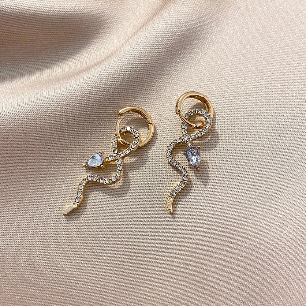 Elegant gold snake dangle earrings with a captivating serpentine design