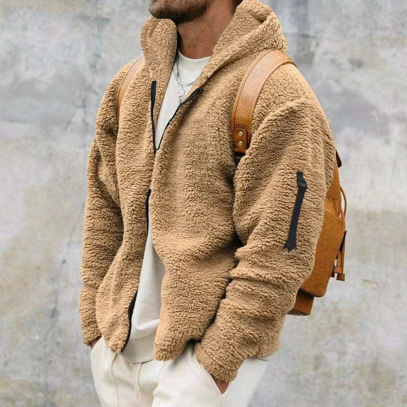 Plush hooded jacket in various colours, featuring a cosy design with a relaxed fit and convenient side pockets