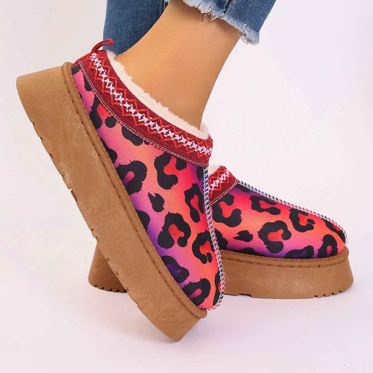 Cozy winter ankle boots featuring festive Christmas prints and plush lining for women