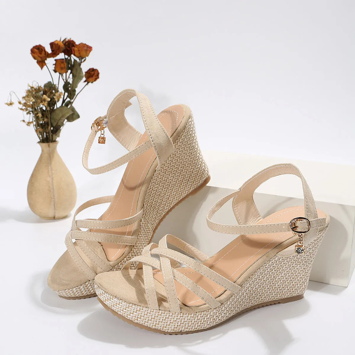 Women's black wedge sandals with a fish mouth toe bracket and fabric upper.