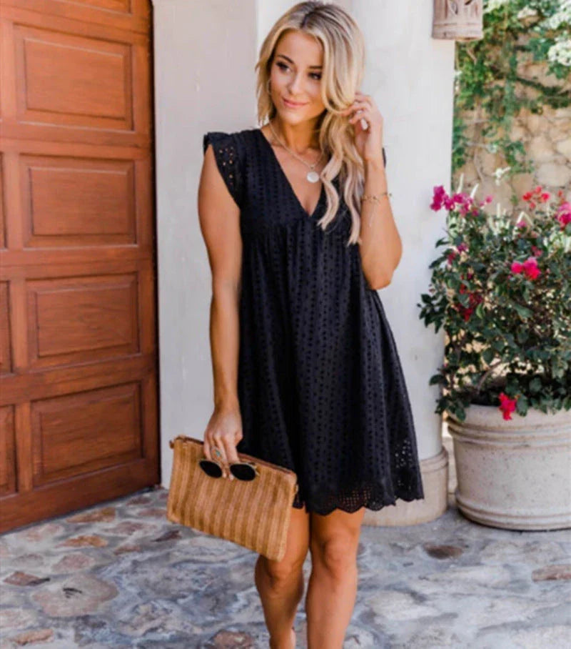Stylish summer beach dress with lace accents, pockets, and a variety of vibrant color options
