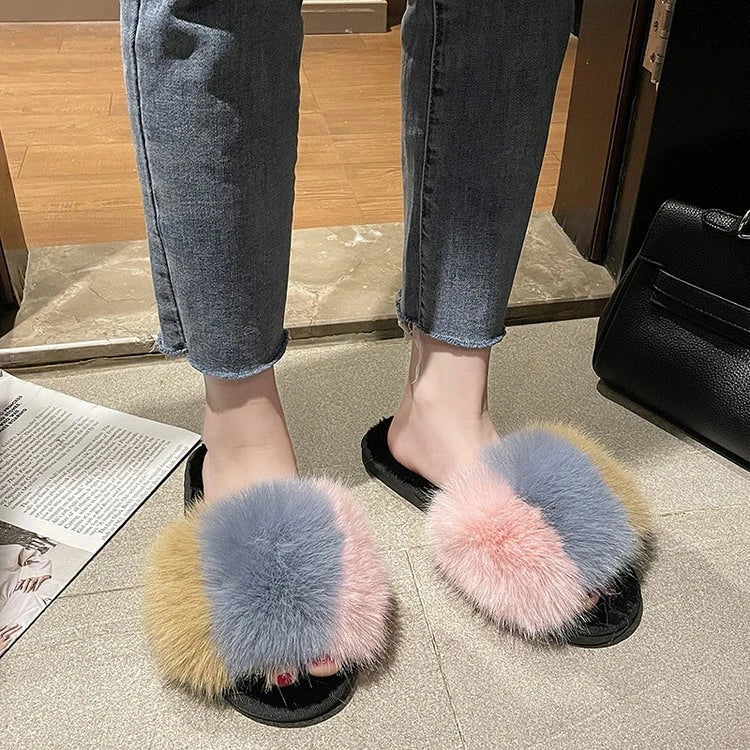 Cosy indoor furry slippers for British women, featuring plush lining, open-toe design, and trendy tassels in a range of classic UK colours.