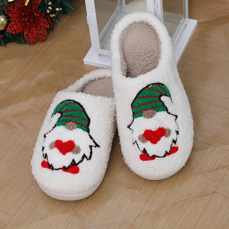 Cozy Santa Claus-themed slippers with plush upper and anti-slip soles for comfortable indoor wear during the holidays
