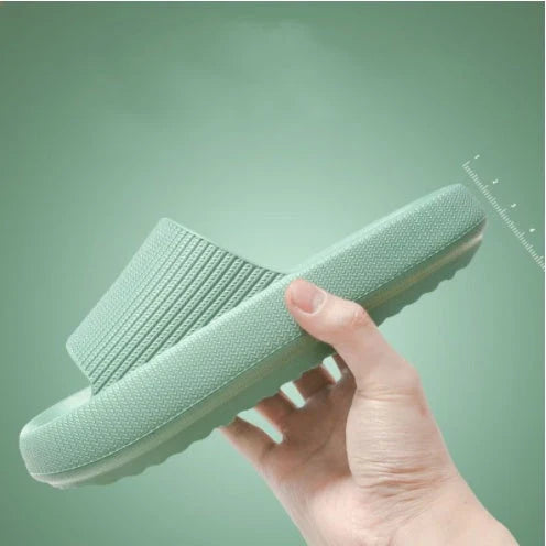Cozy slip-on slippers in various colors for men and women, featuring soft fabric upper and non-slip EVA soles