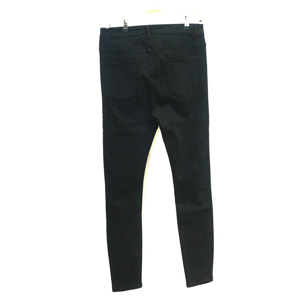 Trendy distressed black skinny jeans for men, featuring a super-elastic cotton construction and edgy, lived-in look