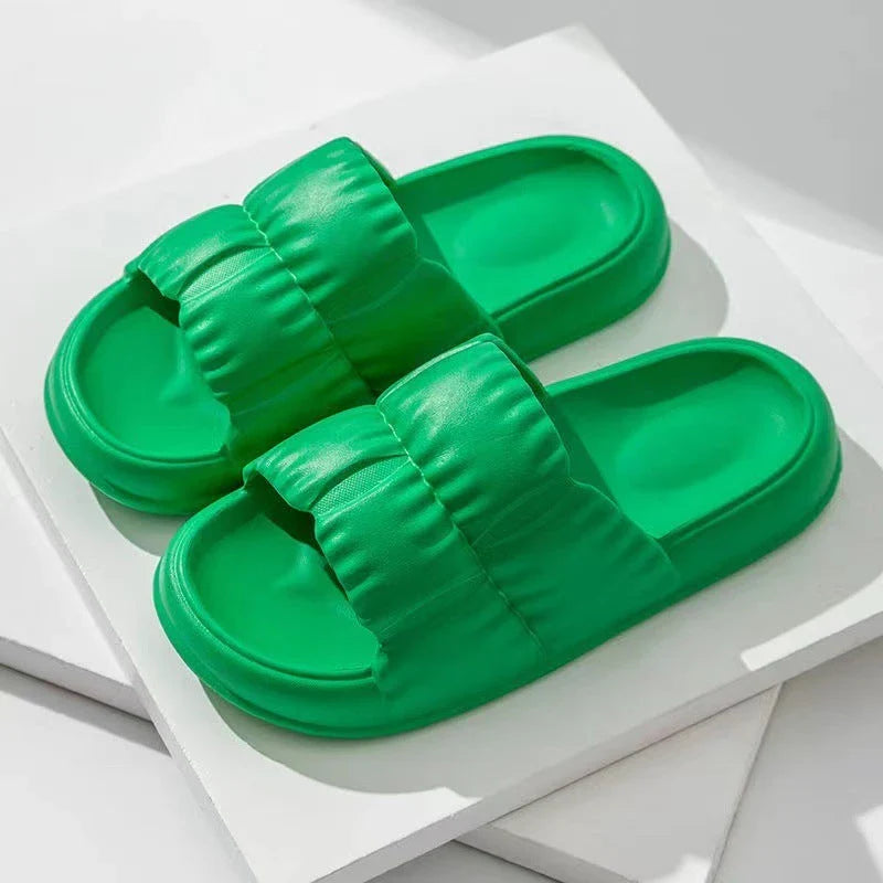 Stylish and comfortable bathroom slippers with a variety of vibrant color options, featuring a durable, waterproof, and anti-slip sole for all-day wear.
