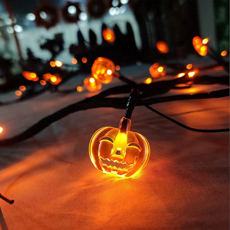 Enchanting Halloween vine lights with playful bat and pumpkin designs, creating a mesmerizing holiday display
