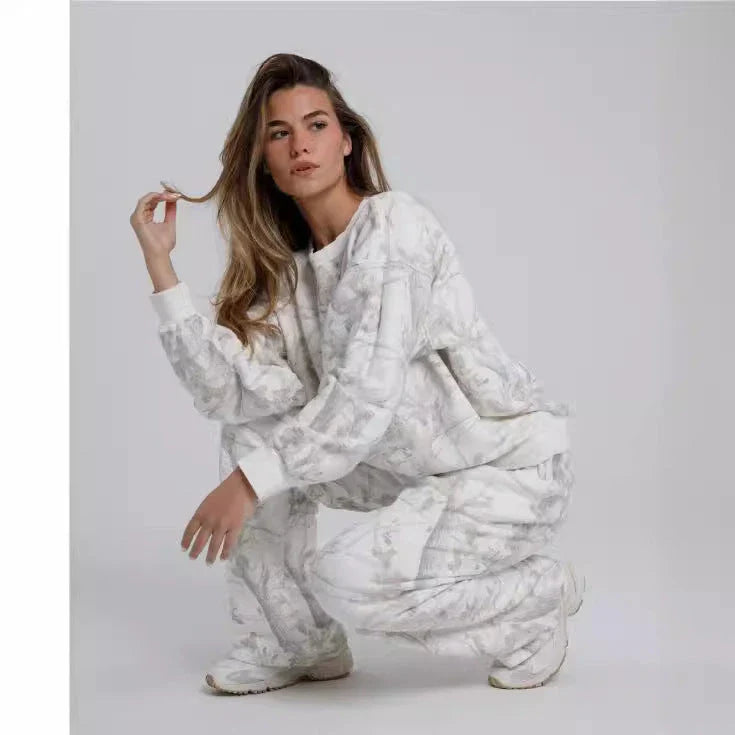 Stylish camo-printed hoodie and jogger set with 3D maple leaf design for autumn/winter fashion
