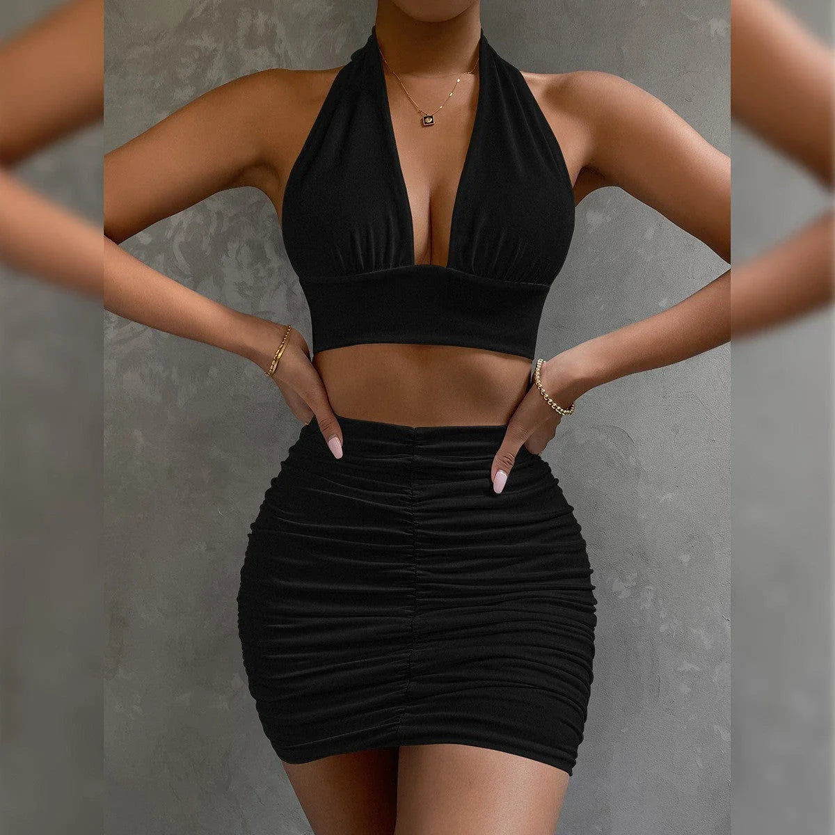 Elegant 2-piece dress suit featuring a halter lace-up top and pleated knee-length skirt in a variety of fashion colors