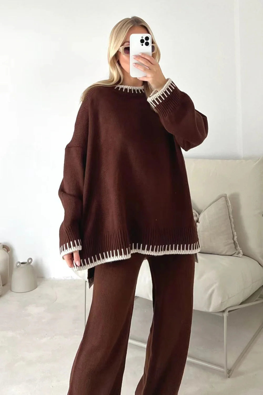 Stylish women's two-piece suit set with long-sleeved top and loose pants in various colours