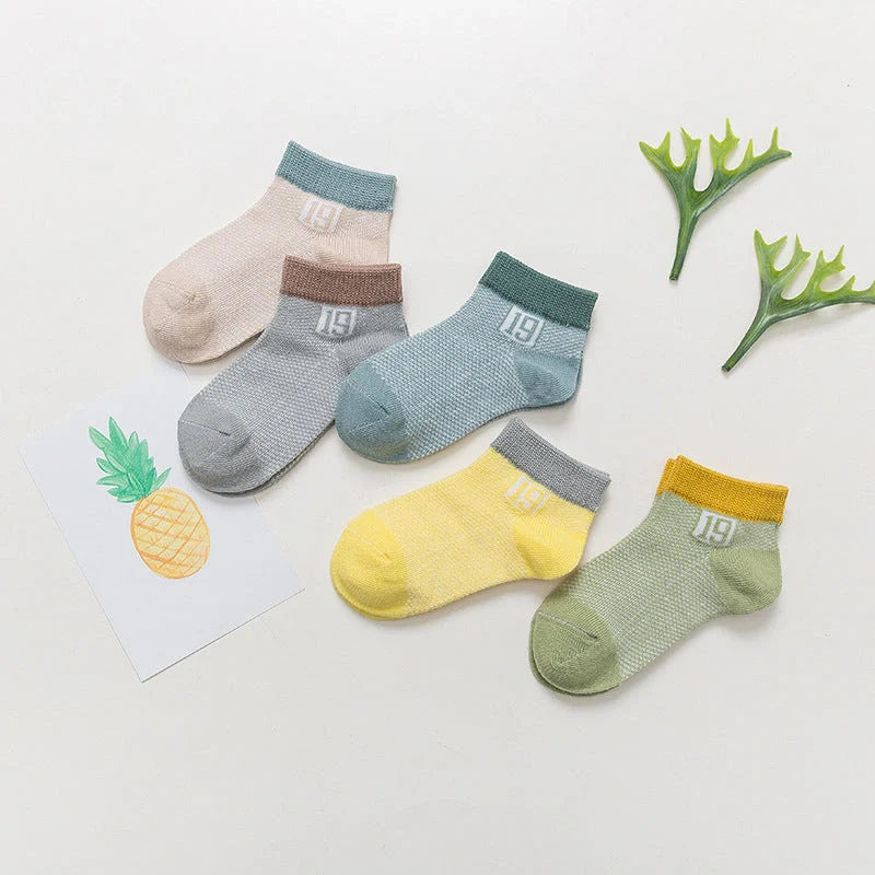 Cotton breathable baby socks in various colours and sizes
