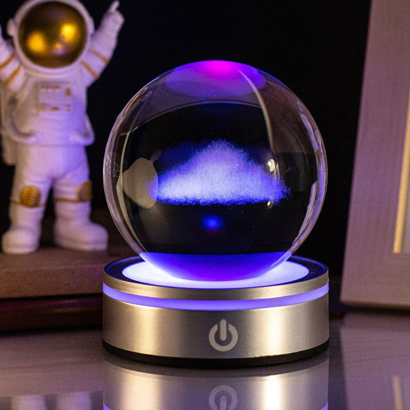 Luminous crystal ball with various celestial-inspired designs, including the Milky Way, Solar System, and Constellation.