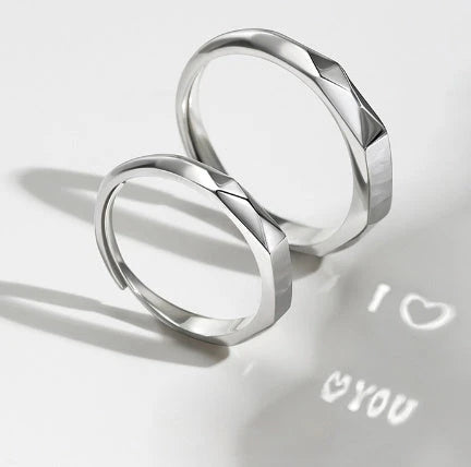 Elegant S925 sterling silver rings with a hidden love pattern design, adjustable sizing for a personalized fit.