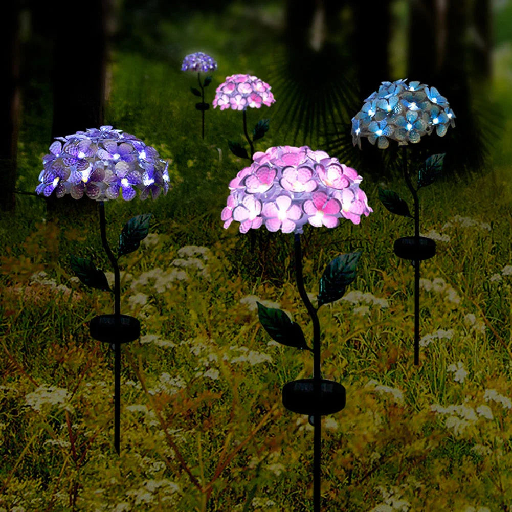 Solar-powered hydrangea garden lights in various colors placed outdoors to provide ambient lighting