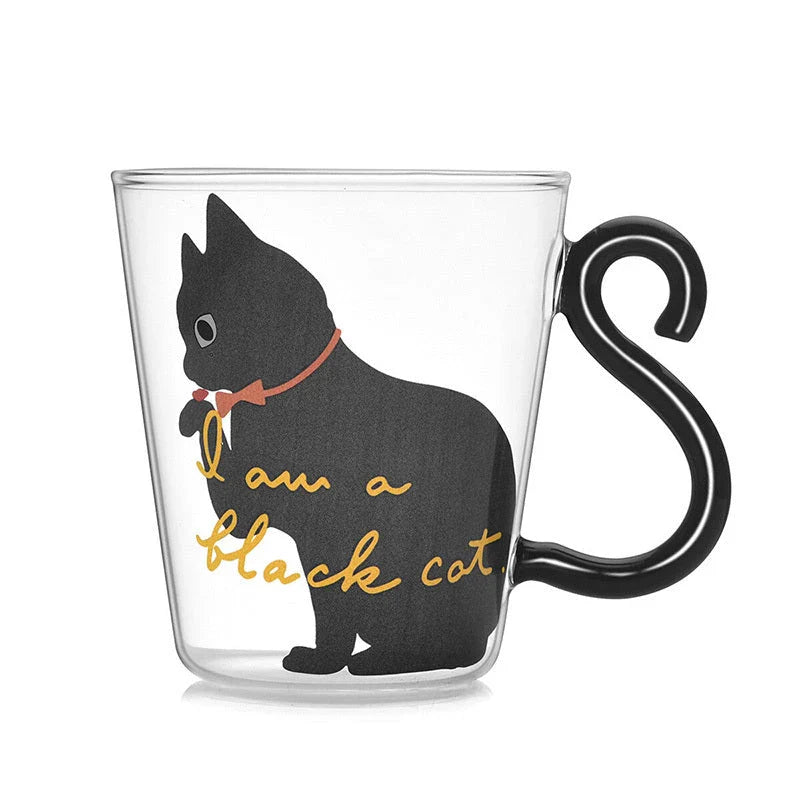 Adorable cat-themed glass mug with a whimsical cat-shaped handle, perfect for coffee, tea, and juice lovers