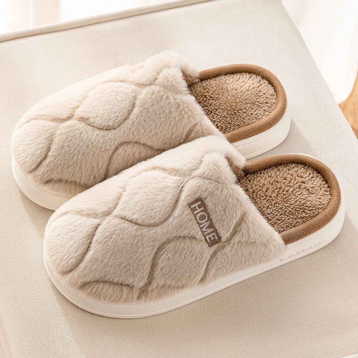 Cozy plush slippers with a soft, luxurious upper and durable PVC sole for comfortable indoor wear
