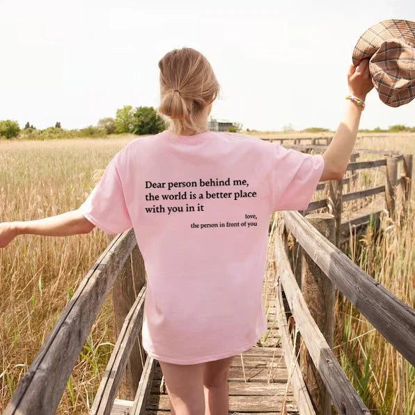 Stylish women's graphic t-shirt with trendy slogan, featuring a vibrant print design and comfortable short sleeve silhouette.