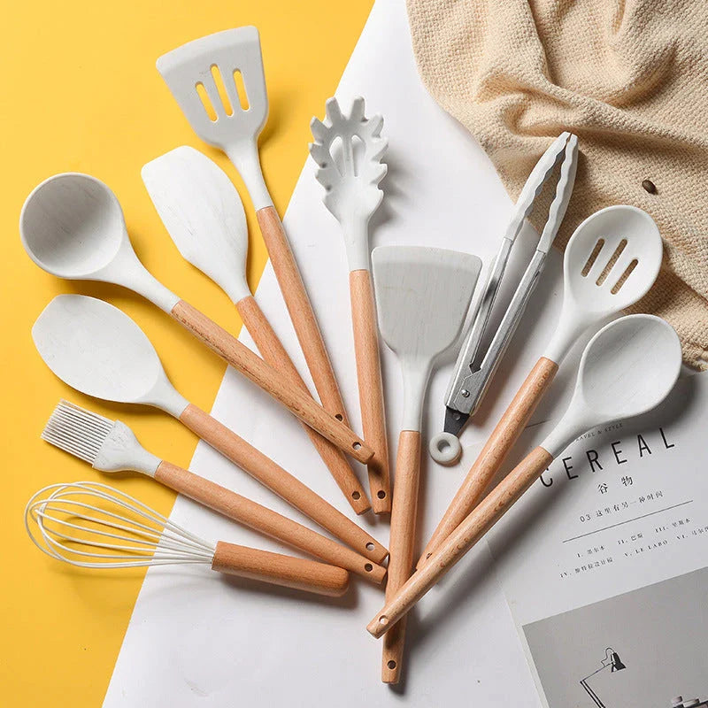Premium silicone cooking tool set with elegant marbled wooden handles, designed for high-temperature cooking and baking tasks