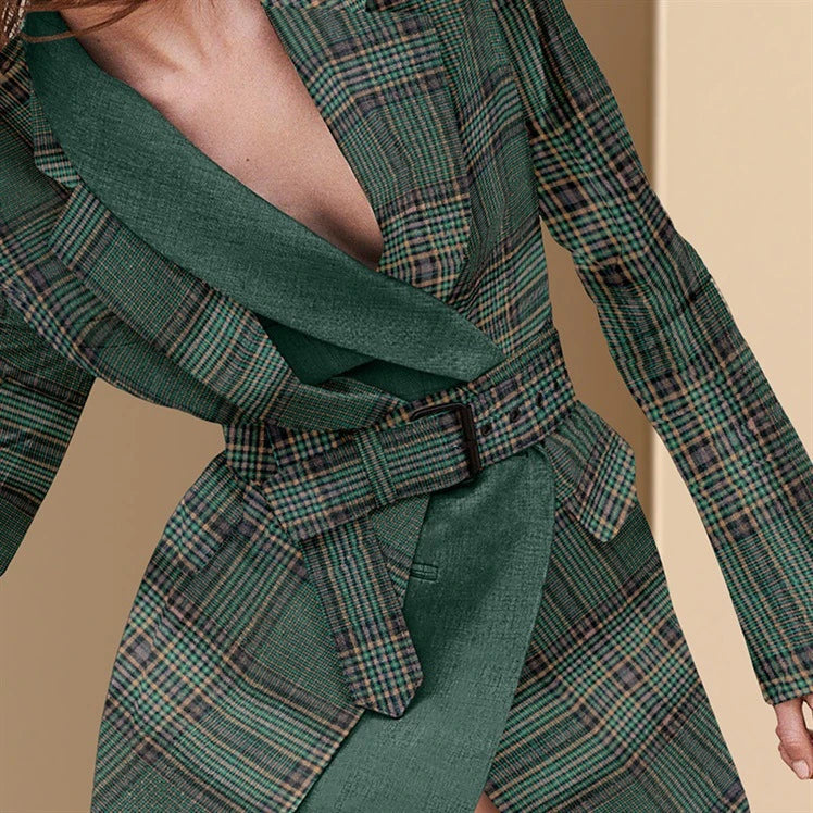 Premium plaid suit jacket for women, featuring a sophisticated design, expert tailoring, and a touch of feminine skirt-like detailing.