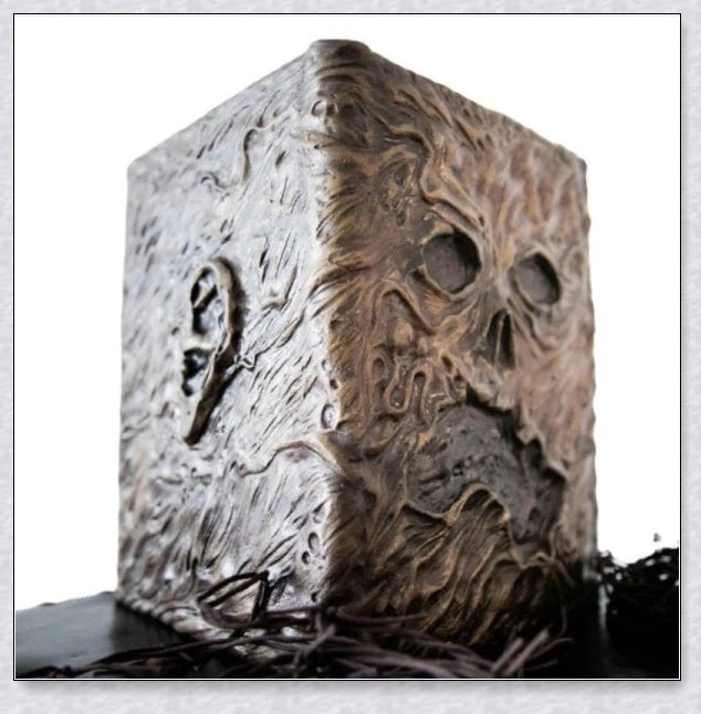 A haunting Necronomicon book with an embossed monster cover, aged pages, and a leathery, deathly texture