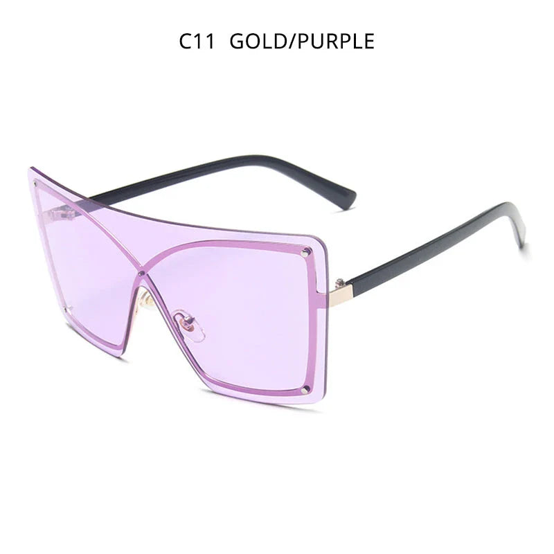 Stylish oversized flat top sunglasses with a rimless design, providing UV protection and a comfortable fit for the modern British woman