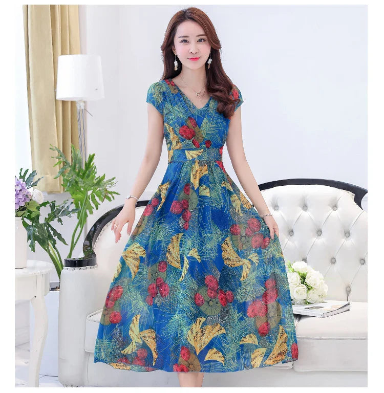 A graceful chiffon dress with short sleeves and a floor-sweeping hem, featuring a delicate printed pattern for a sophisticated, elegant look.