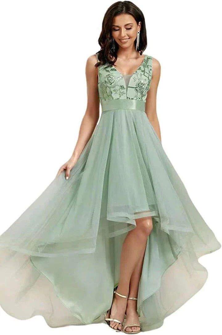 Elegant sequin gauze bridesmaid prom dress in a variety of sophisticated colours, featuring a flattering mid-length silhouette and sleeveless design with shoulder straps