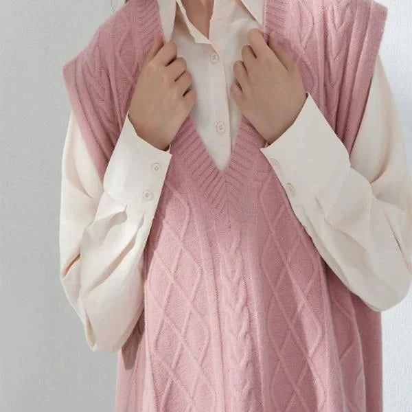 Cosy oversized knitted vest in various colours, featuring a sleeveless V-neck design for versatile layering