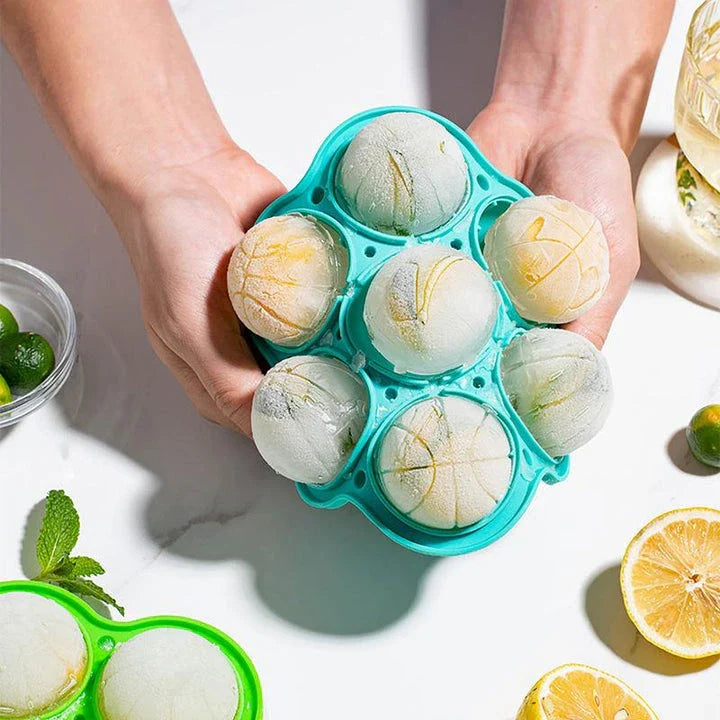 Spherical silicone ice mould with seven holes for creating elegant ice spheres to chill premium drinks