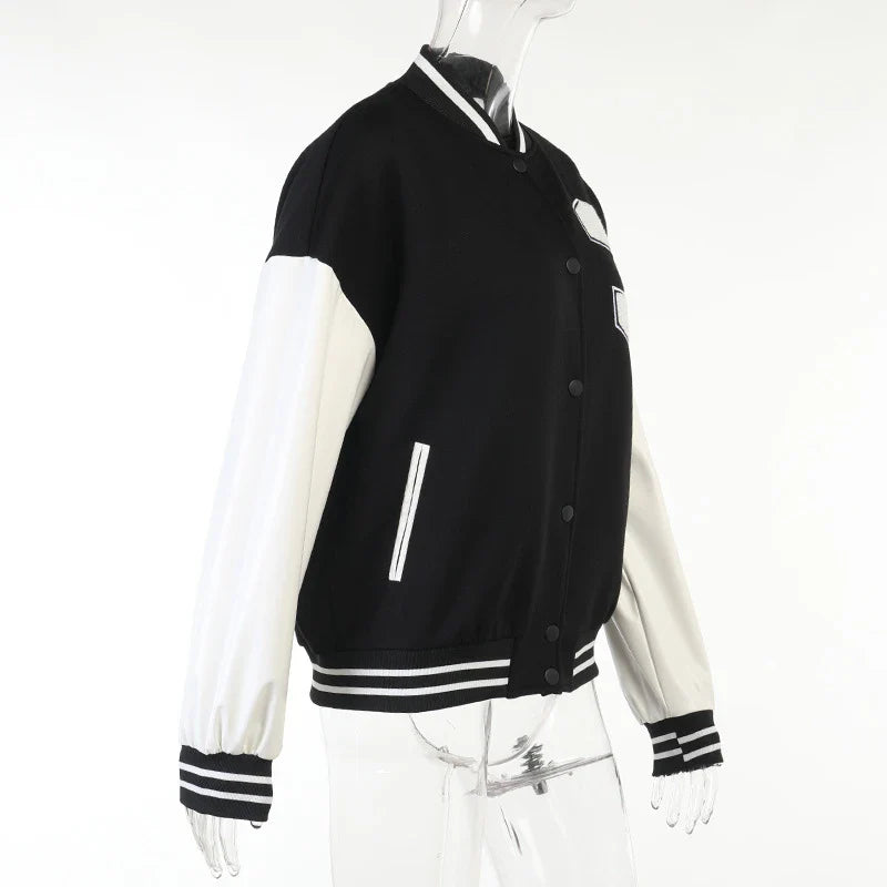 A classic British-style baseball jacket with contrast PU stitching, showcasing a sophisticated and versatile design for casual wear.
